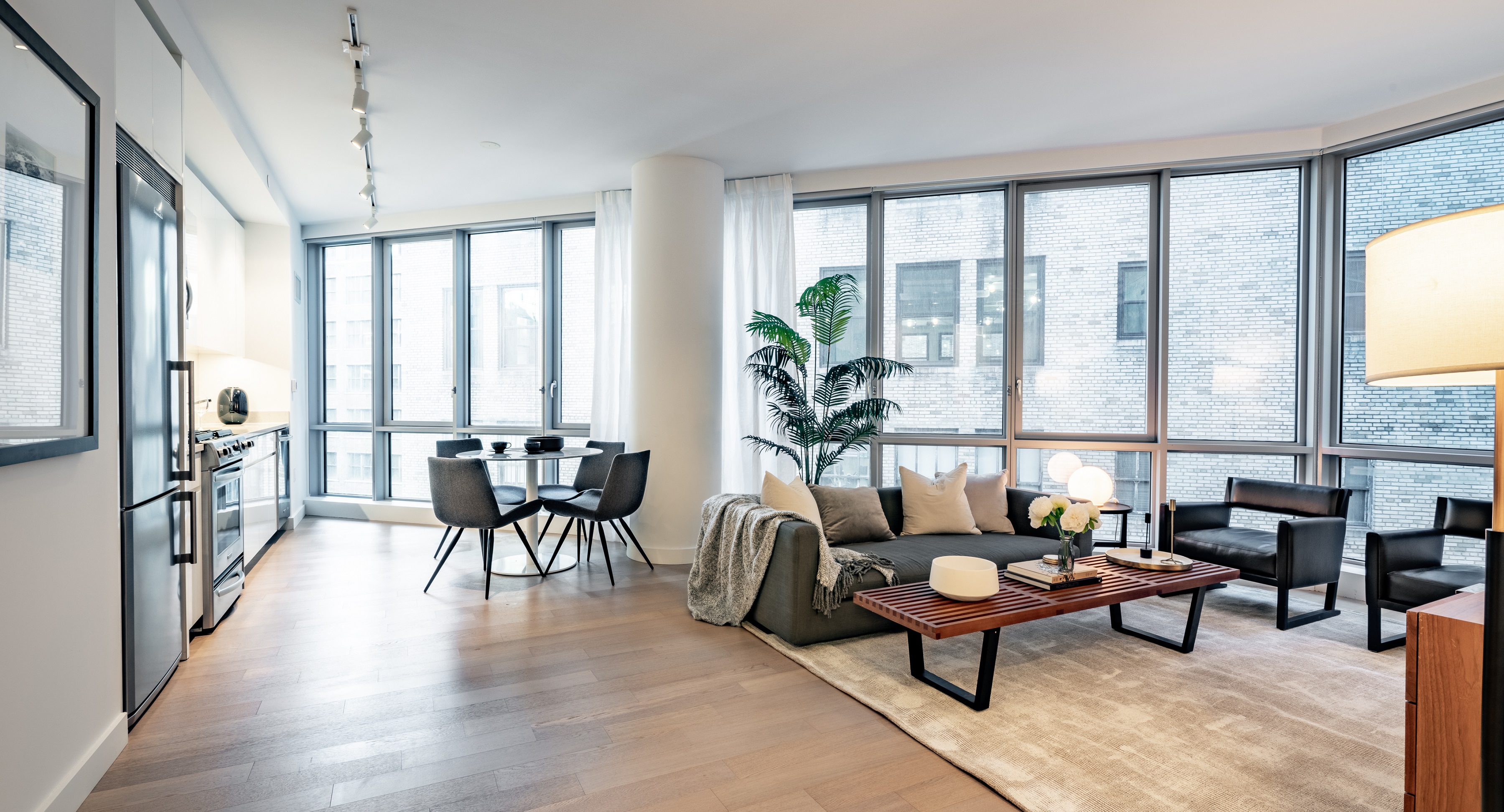 Each apartment is drenched in natural light with floor-to-ceiling windows and views of the NYC skyline.